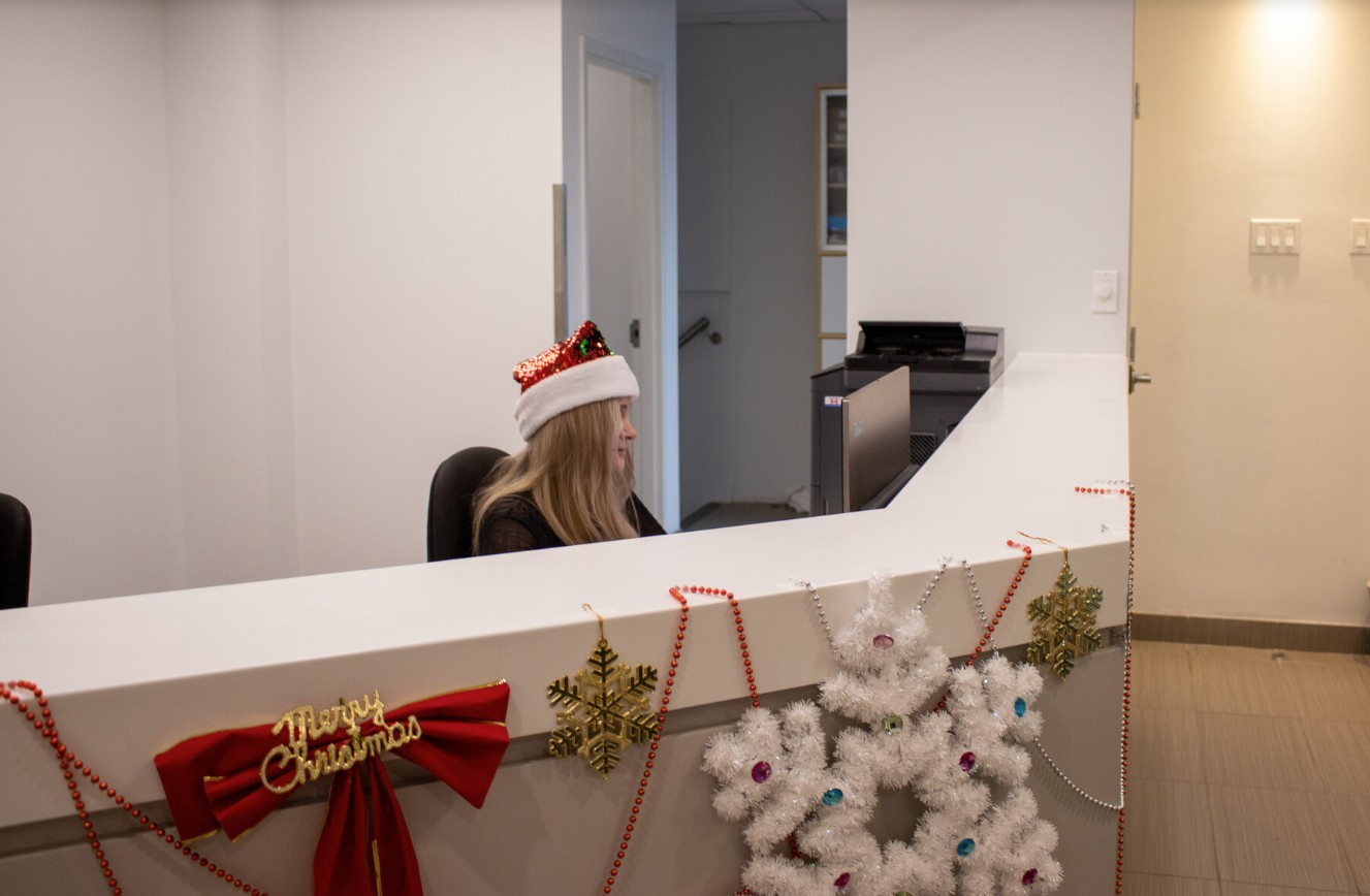 Dental team member cleaning instruments in the clinic