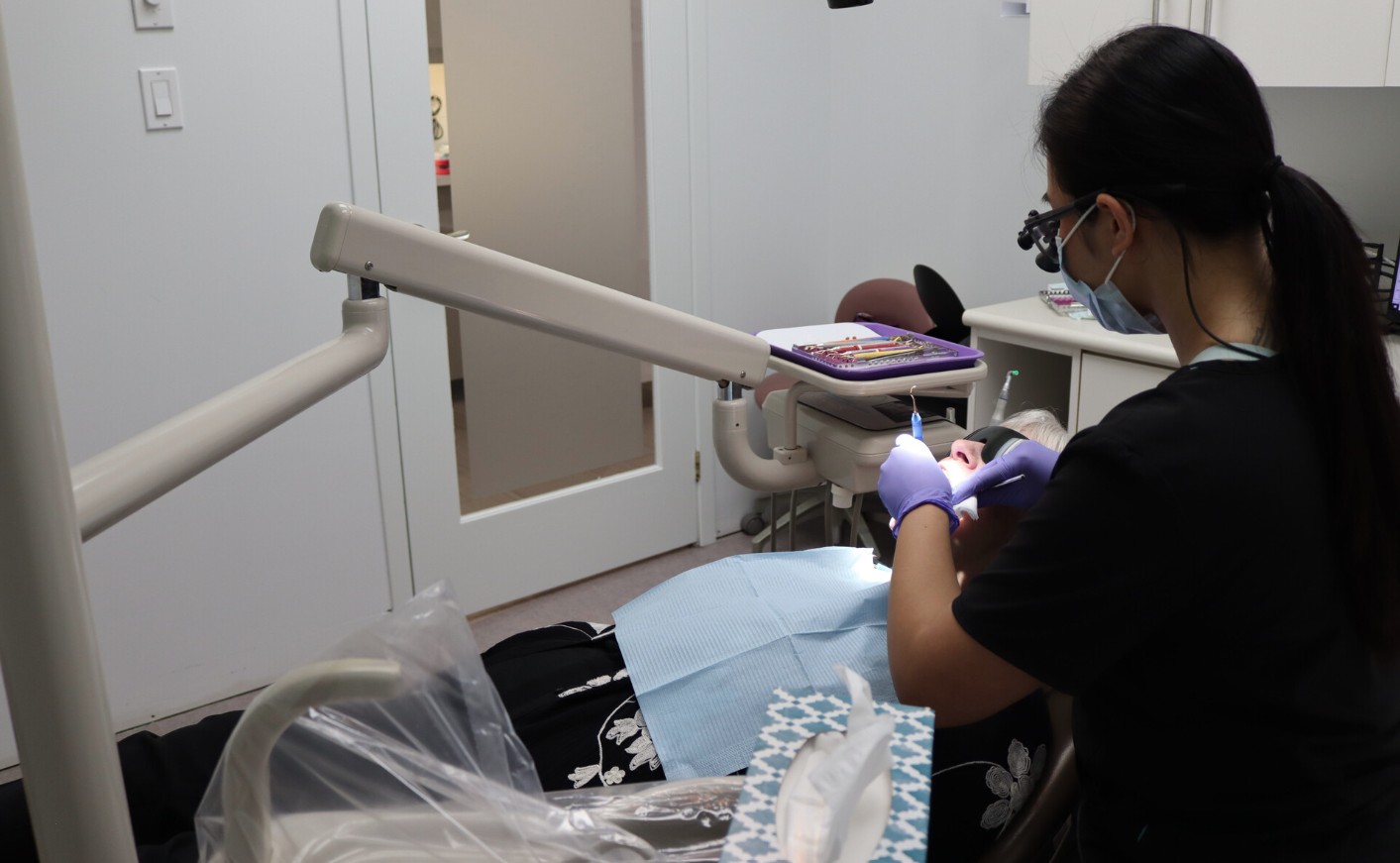Preventive dental visit focused on gum health at a Yorkville Toronto clinic