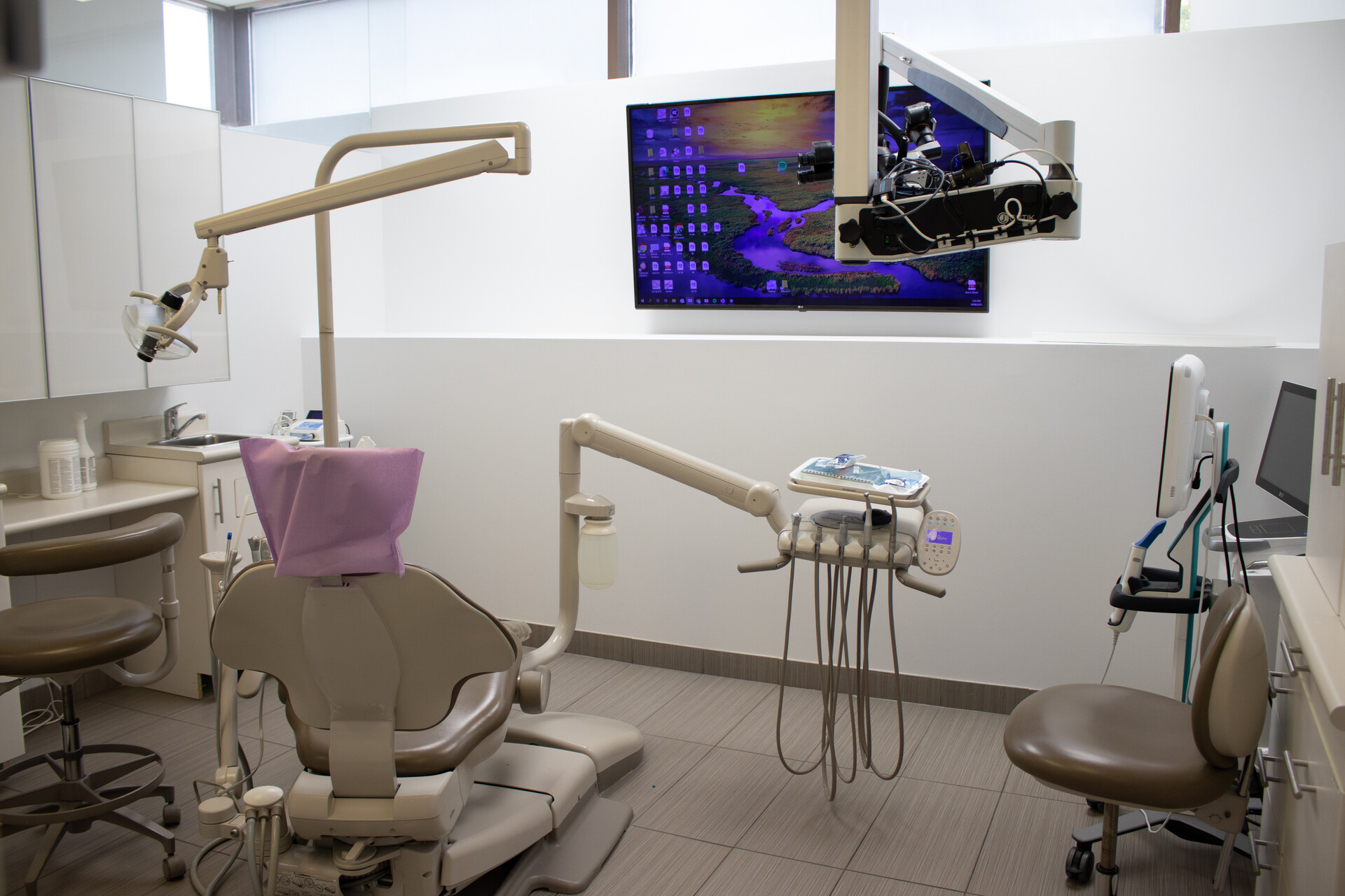 Modern dental treatment room at Dentistry on 66 in Yorkville, Toronto
